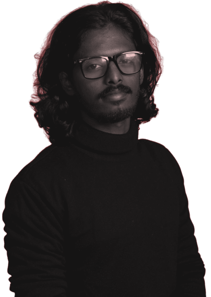 Digital content specialist in black turtleneck with glasses, long hair, and red outline effect on black background.”