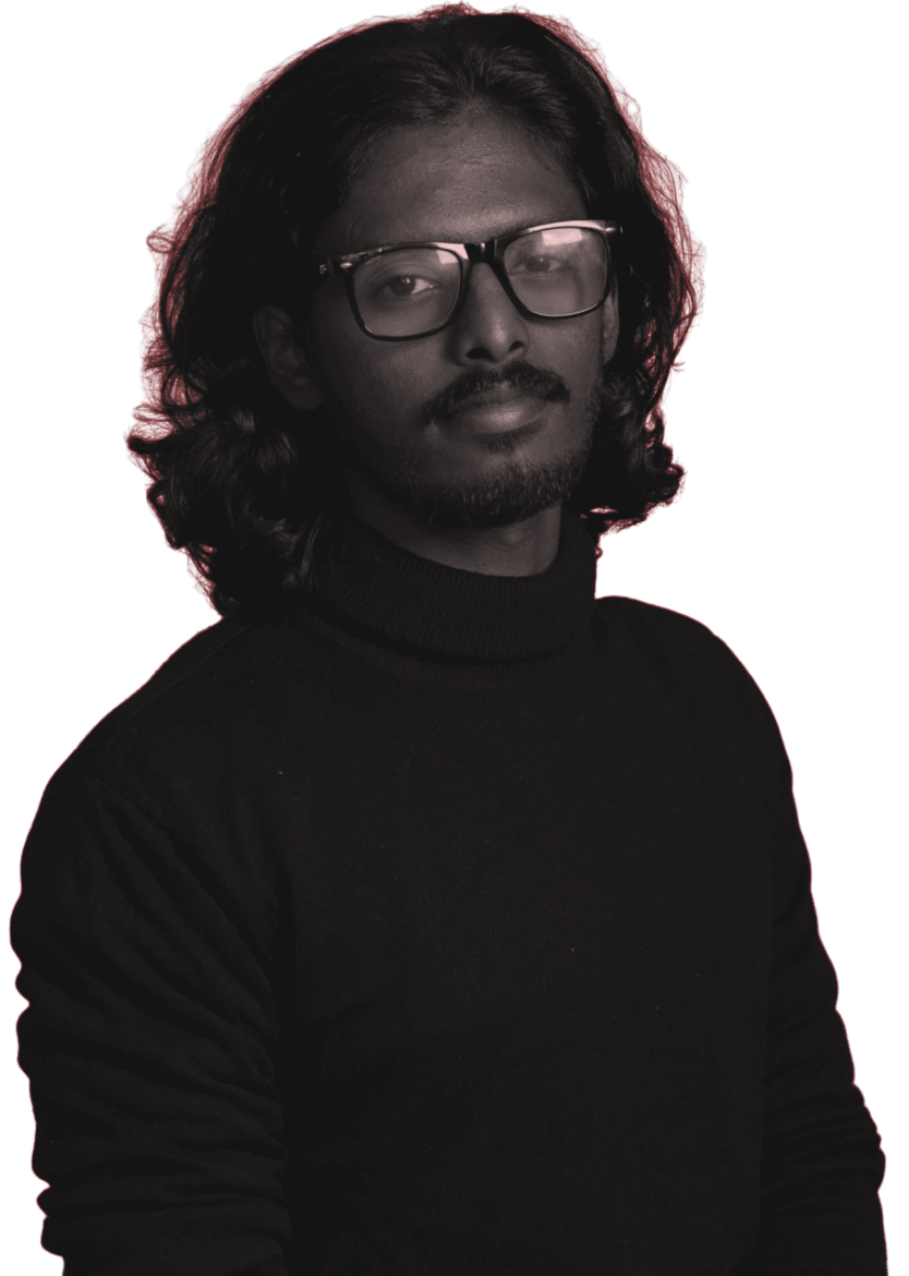 Digital content specialist in black turtleneck with glasses, long hair, and red outline effect on black background.”
